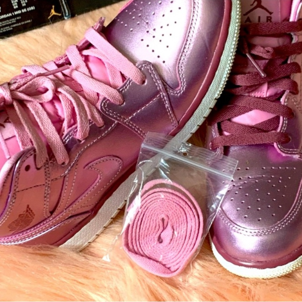 Air Jordan 1’s mid top metallic pink